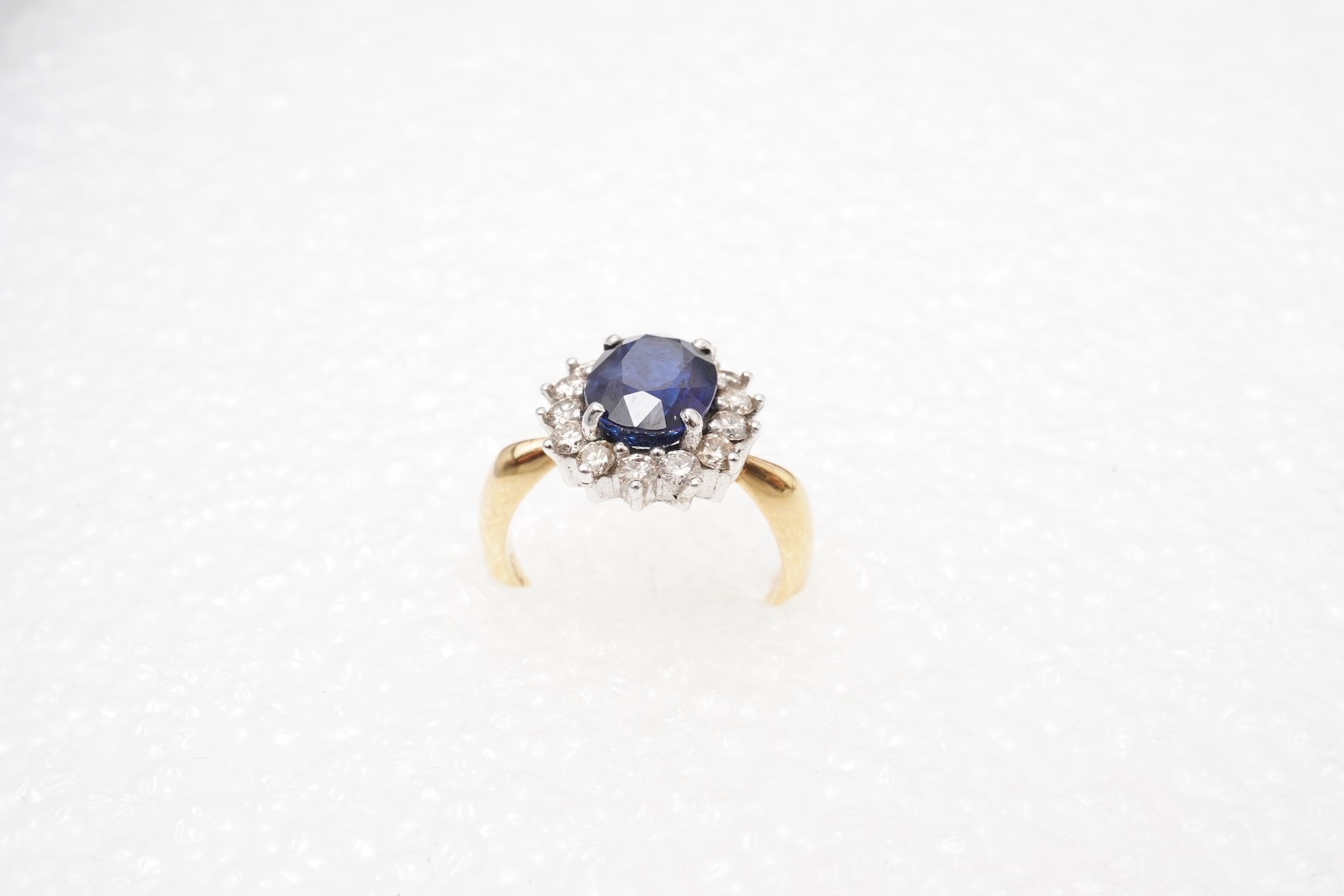 A sapphire and diamond cluster ring
